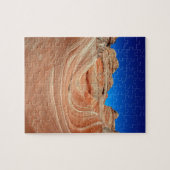 赤、ベージュ、黄色の縞模様が風に巻き付いている ジグソーパズル (横)