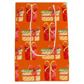 赤、黄色のクリスマスギフトオレンジ中抱き枕 ミディアムペーパーバッグ (裏面)