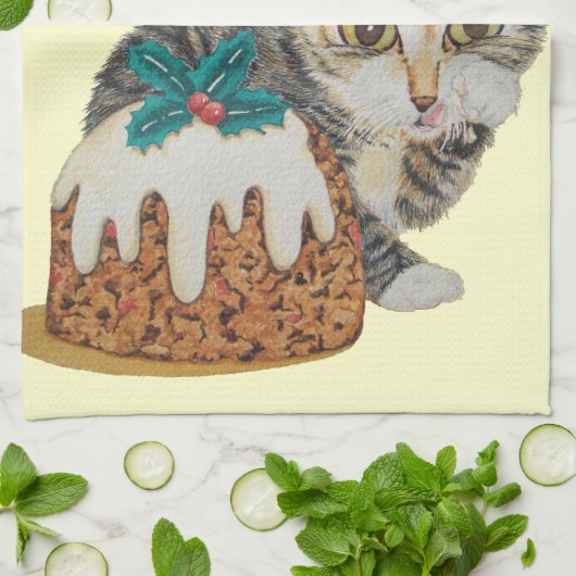 足のクリスマスを舐めているかわいい子ネコの灰色の虎猫 キッチンタオル (折り畳み)