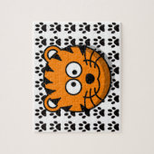 足のプリントの背景を持つ微笑の漫画のトラ ジグソーパズル (縦)