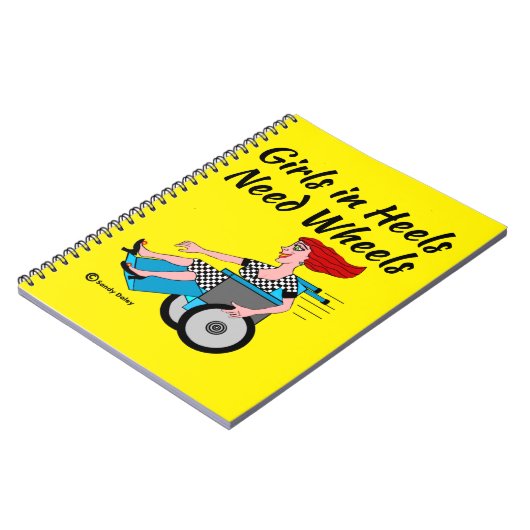 車いす女の子がノートに赤転が頭を付け ノートブック (左側)