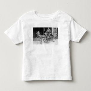 車輪の異様なそりに利用される訓練されたシカ トドラーTシャツ