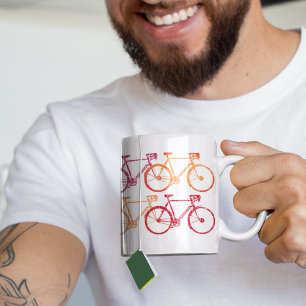 車輪カラフルを重ねた自転車 コーヒーマグカップ