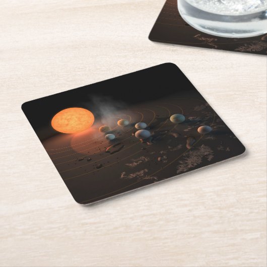 軌道星にあるトラピスト–1の7つののまわりに惑星。 スクエアペーパーコースター (アングル)