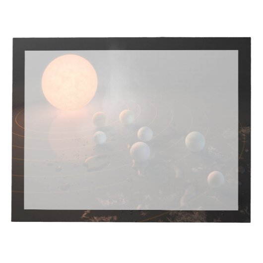 軌道星にあるトラピスト–1の7つののまわりに惑星。 ノートパッド (正面)