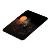 軌道星にあるトラピスト–1の7つののまわりに惑星。 マグネット (左側)