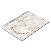 軽いクリームに白いラン ノートブック (左側)