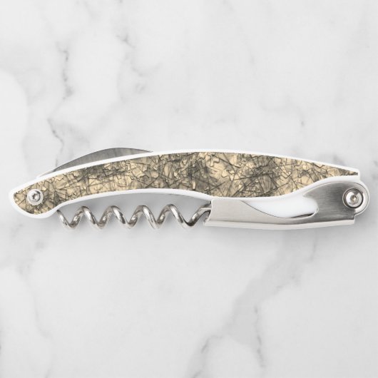 軽く斑点の多いカーキに傷を付ける ソムリエナイフ (裏面)