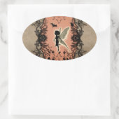 輝きのある可愛い妖精白熱［赤熱］光を放つのシルエット。 楕円形シール (バッグ)