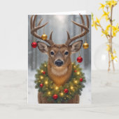 輝くクリスマスリースを身に着けた大きな牡鹿 カード (黄色い花)