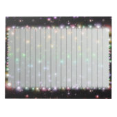 輝く白熱［赤熱］光を放つ虹の星が並んだ宇宙 ノートパッド (正面)