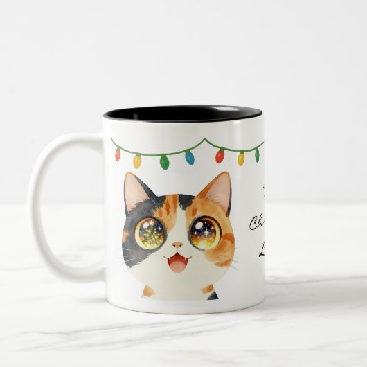 輝く瞳の猫 聖なるクリスマス ライト ツートーンマグカップ (左)