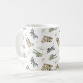 轟音のアールデコの飛行機 – 青い緑のパターン。 コーヒーマグカップ (正面左)