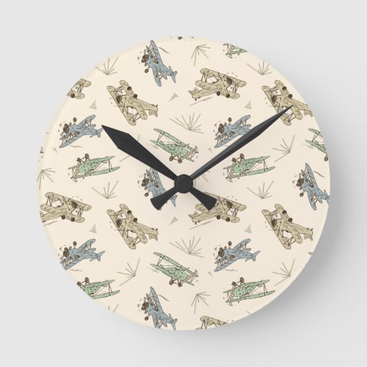 轟音のアールデコの飛行機 – 青い緑のパターン。 ラウンド壁時計 (正面)