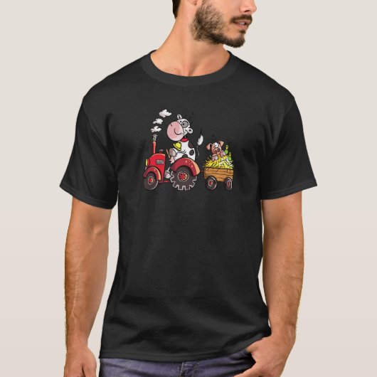 農場の動物のためにトラクターを運転する牛 Tシャツ (正面)