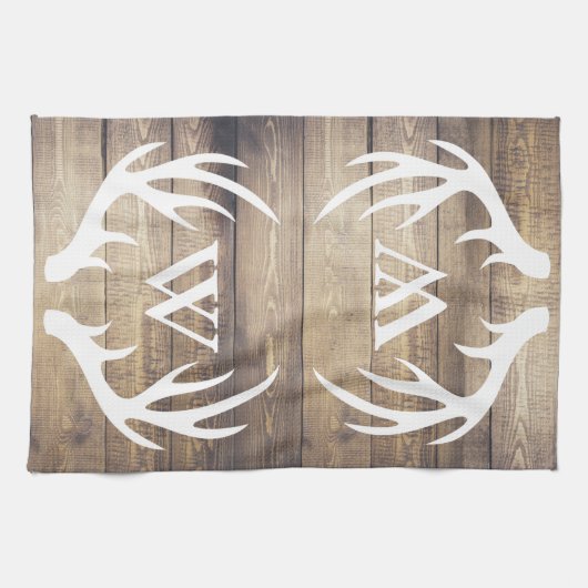 農家の軽い納屋の木製の板の(雄ジカの)枝角のモノグラム キッチンタオル (横)