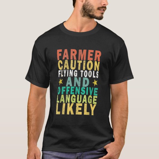 農家の飛んでいる注意ツールと不快な言語 Tシャツ (正面)