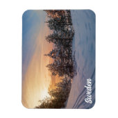 近くの雪凍っていの森の夕日 マグネット (縦)