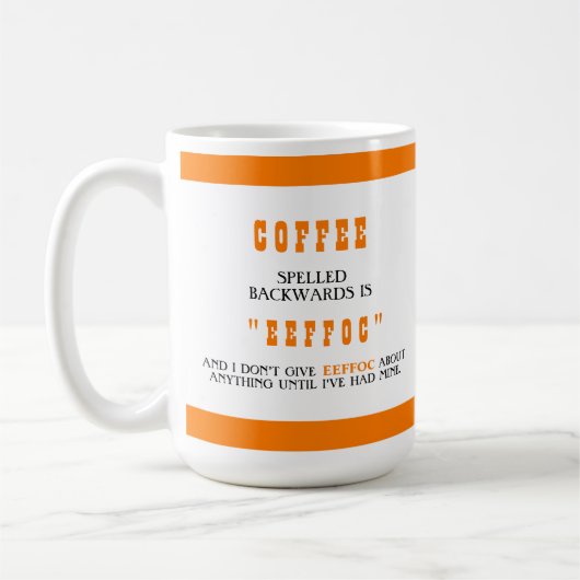逆さおもしろいにつづるコーヒーはEeffocオレンジ コーヒーマグカップ (左)