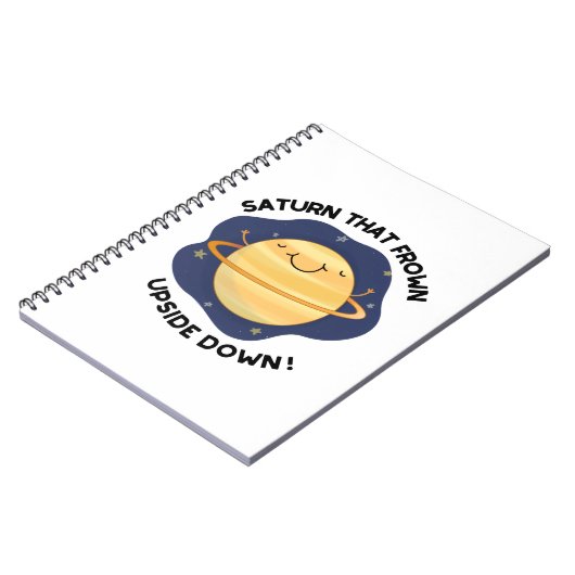 逆さまに顔を曇らせたおもしろい土星 ノートブック (左側)
