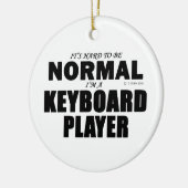通常のキーボードプレーヤー セラミックオーナメント (左)