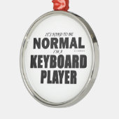 通常のキーボードプレーヤー メタルオーナメント (左)