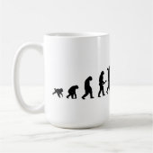 進化の人のピアノピアニスト音楽ミュージシャン コーヒーマグカップ (左)
