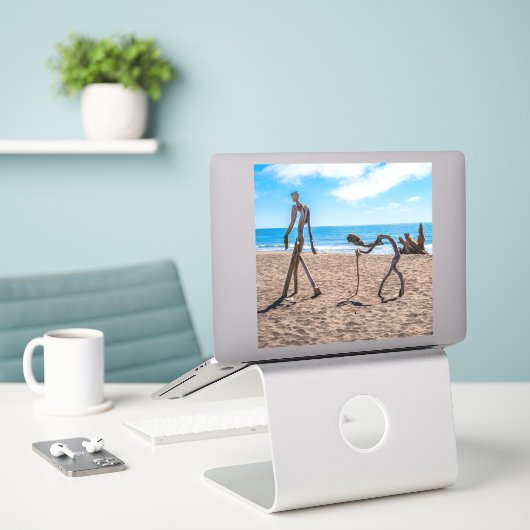 進化 シール (デスク上のノートパソコン)