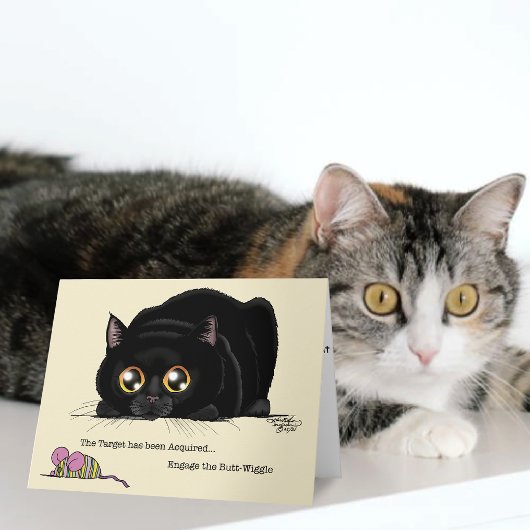 遊び心あふれるクリーム色の子猫の尻尾フリフリ黒猫 カード