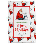 遊び心のあるキャラクターサンタクロースの輝くクリスマス ミディアムペーパーバッグ (正面)