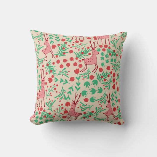 遊び心のあるピンクのトナカイと冬の葉っぱの模様 クッション (正面)
