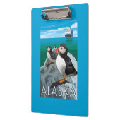 遊航船を見ているツノメドリ クリップボード (左)