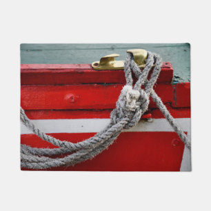 運河ボートの真鍮のクリートの古い弓ロープ ドアマット