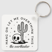 過剰思考のおもしろい引用文 キーホルダー (裏面)