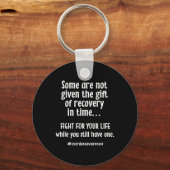 過剰摂取認識度中毒回復T キーホルダー (正面)