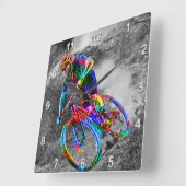 道の下で競争しているテクニカラー山のバイクもしくは自転車に乗る人 スクエア壁時計 (傾斜)