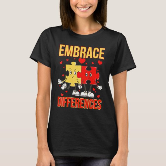 違いを受け入れるおもしろい世界自閉症の日パズル Tシャツ (正面)
