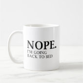 違う。私はベッドに戻る。 コーヒーマグカップ (左)