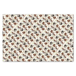 遠ぼえのバセットハウンドはティッシュペーパーの後をつけます 薄葉紙