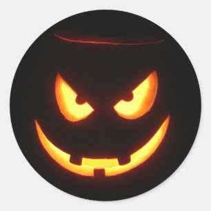 邪悪な笑ったハロウィンのカボチャ顔 ラウンドシール