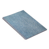 酸洗い青いジーンズ、デニムのテクスチャー。 ノートブック (右側)