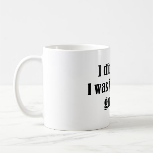 重力の仕事 コーヒーマグカップ (左)