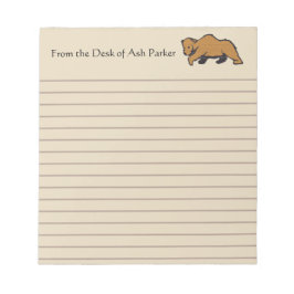 野生生物のグリ素朴ズリーベアの机から ノートパッド