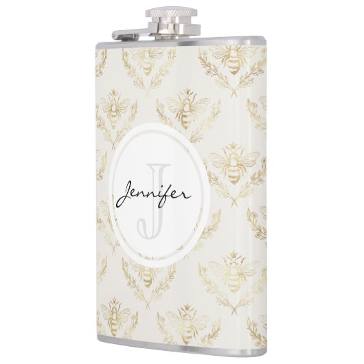 金のまわりにと王冠のモノグラム フラスク (左)