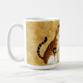 金の背景にオレンジ色の猫が2匹 コーヒーマグカップ (左)
