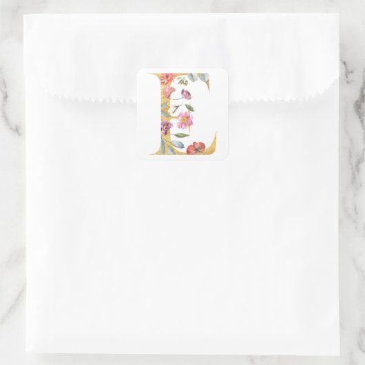 金のEの文字に花 スクエアシール (バッグ)