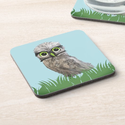 金ゴールドおよび銀製の掘り進むフクロウの装飾 コースター (左側)