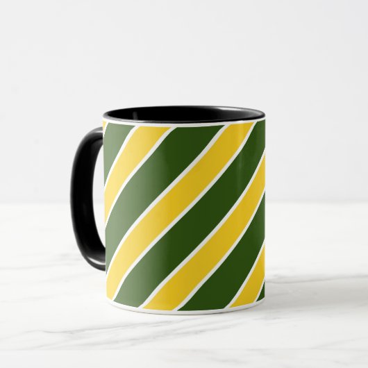 金ゴールドか緑の白いバンドは、傾けられて縞で飾りましたり、曲がりました マグカップ (正面左)