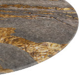 金ゴールドで覆われた灰色の大理石のテクスチャ付きの背景。 カッティングボード (角)