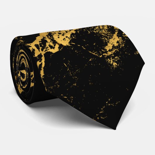 金ゴールドによってはねかけられる黒 ネクタイ (ロール)
